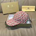 Baseball cap with red and white TB monogram pattern, curved brim.