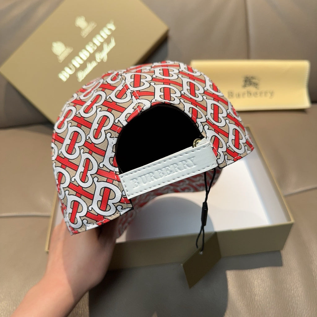 Baseball cap with red and white TB monogram pattern, white strap detail.