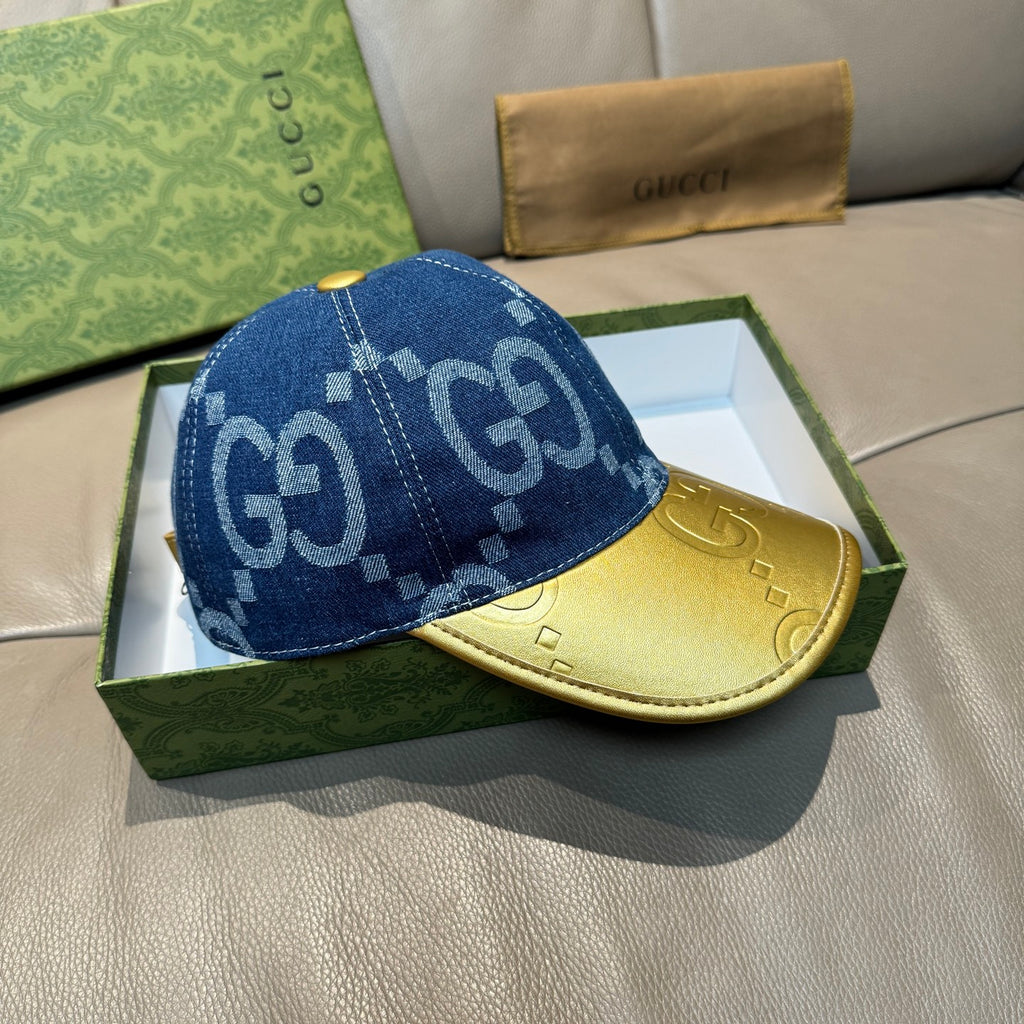 Gucci blue GG denim baseball cap with yellow visor and stitched seam details