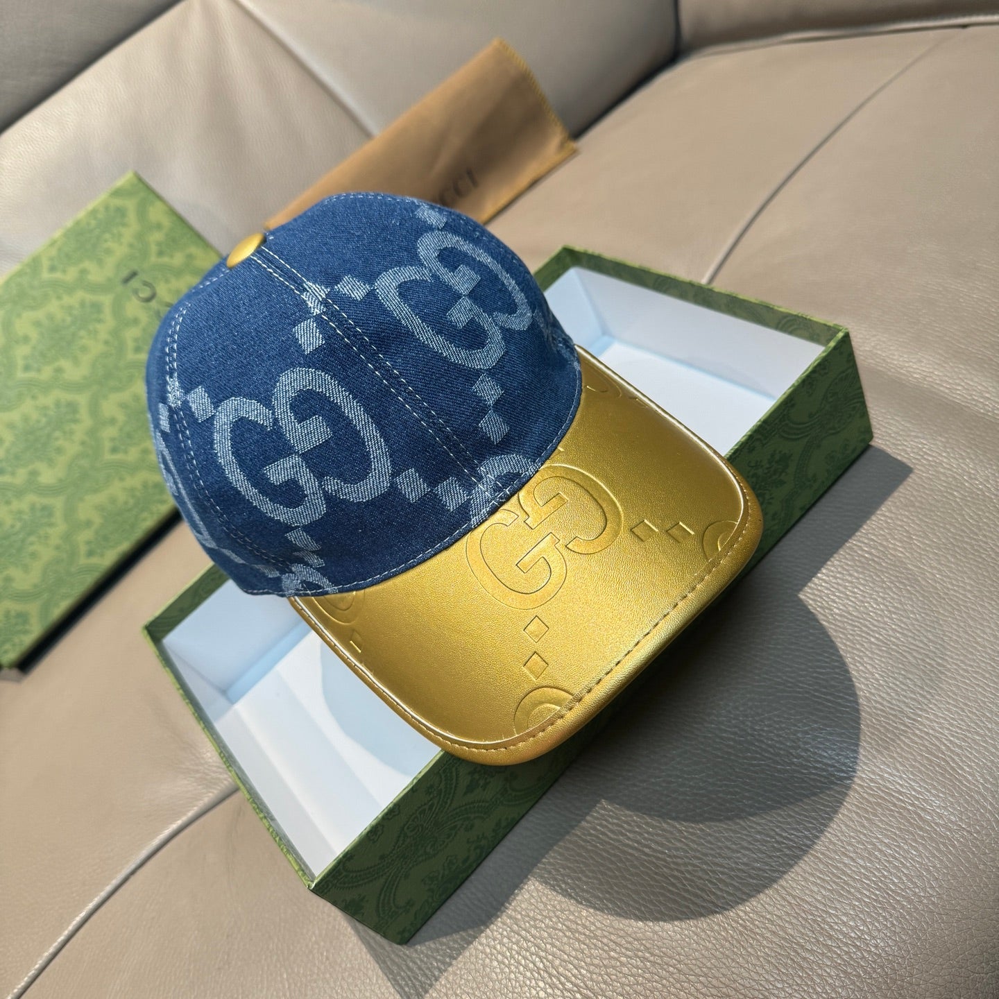 Gucci denim baseball cap with blue GG monogram pattern and yellow brim