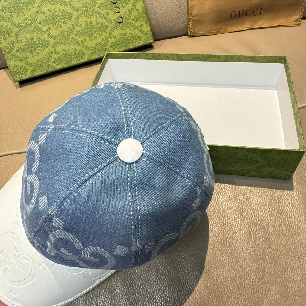 Denim blue Gucci cap with GG jacquard pattern and round top button