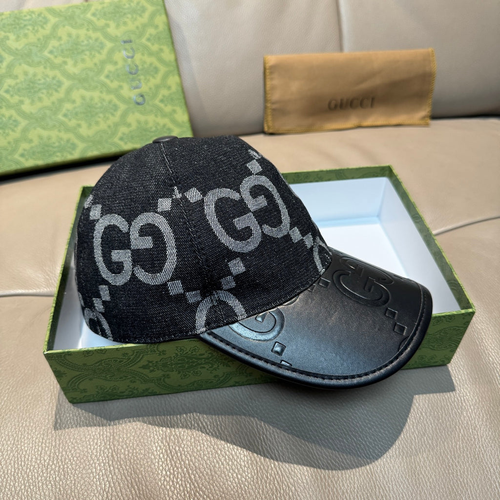 Dark GG monogram baseball cap with black leather front panel and curved brim