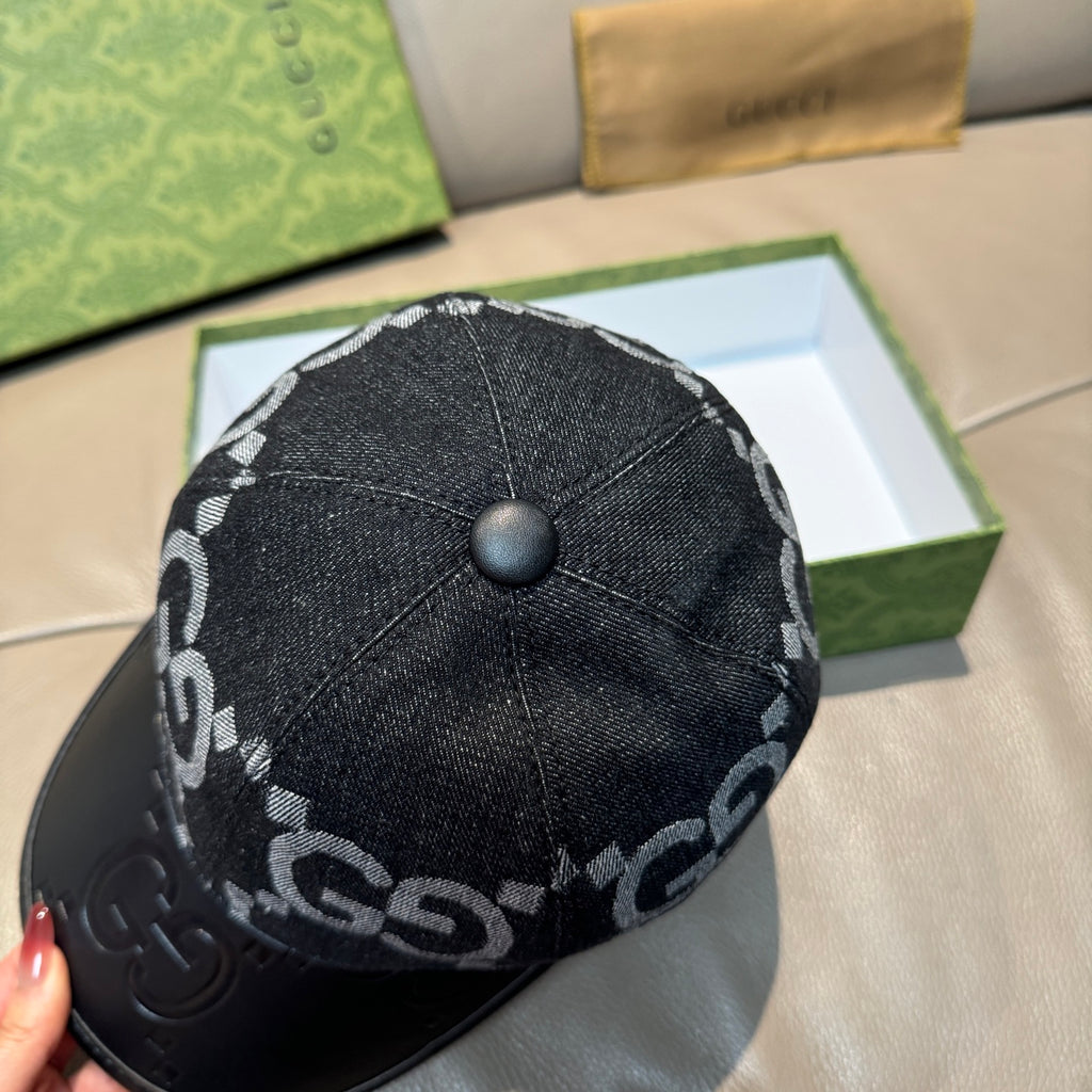 Dark GG monogram baseball cap with top button and black leather brim