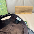 Baseball cap interior view with fabric lining and brand label on strap