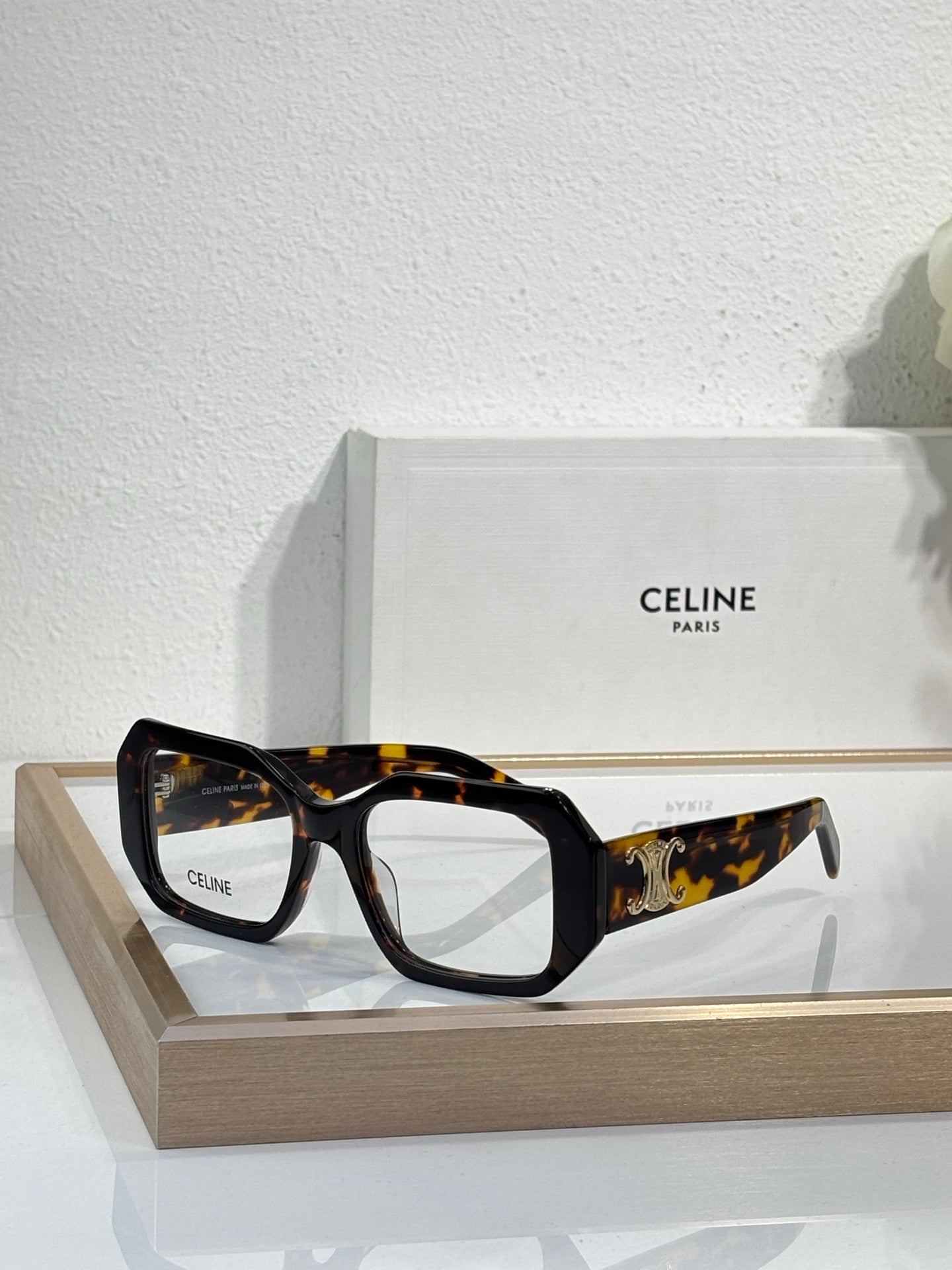 Celine glasses, tortoiseshell square frames with gold logo on the temple