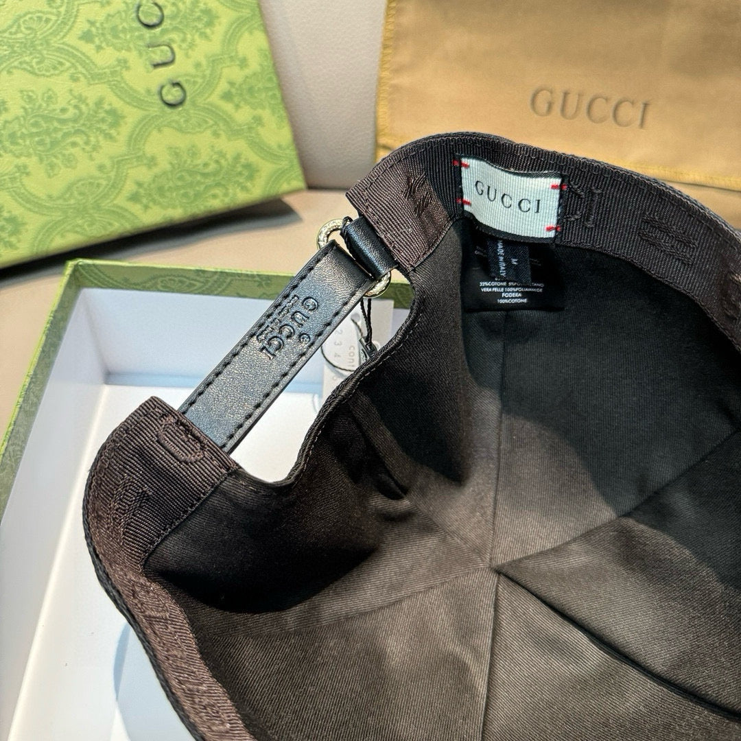 Gucci cap interior, black lining with adjustable strap and Gucci label tag