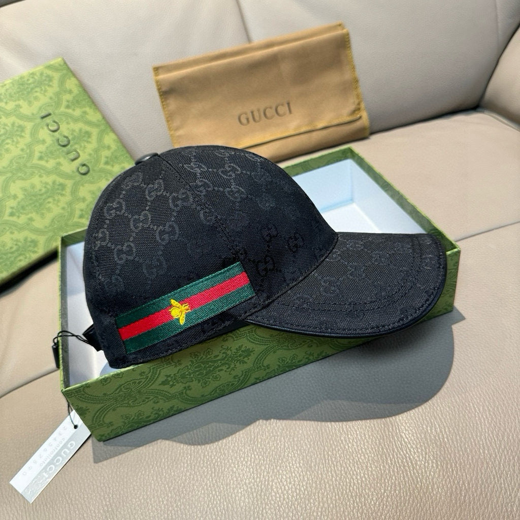 Gucci cap, dark navy GG monogram with green-red Web stripe and gold bee emblem