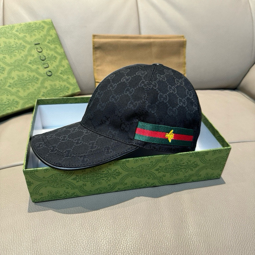 Gucci cap, dark navy GG monogram with green-red Web stripe and gold bee emblem