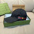 Gucci cap, dark navy GG monogram with green-red Web stripe and gold bee emblem