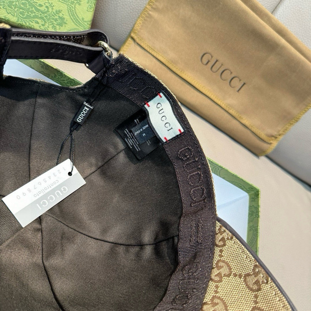 Baseball cap interior with black lining and adjustable strap, with Gucci-branded trim.