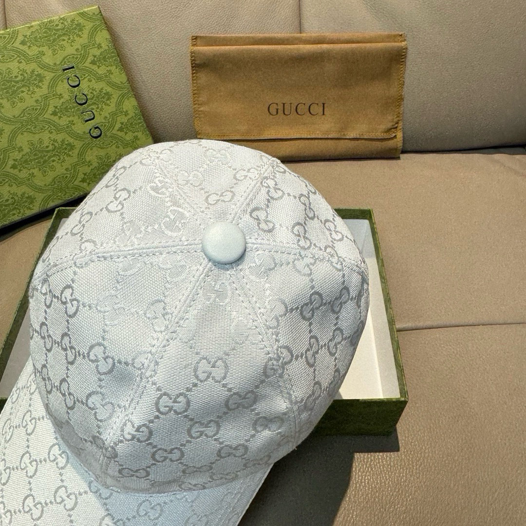 White GG-print baseball cap with round top button and stitched crown