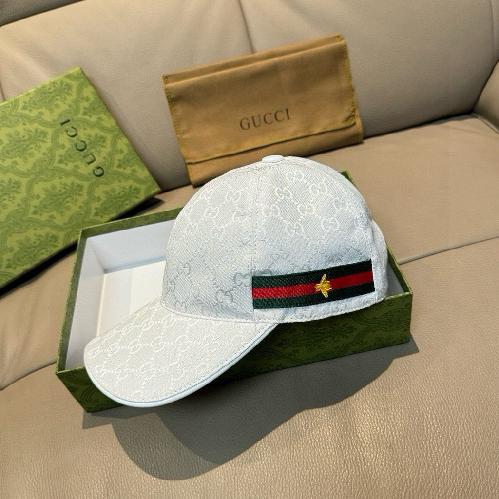 White GG-print baseball cap with green-red web stripe and gold star patch