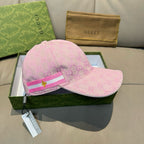Pink monogram baseball cap with pink-and-white stripe band and star emblem