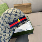 GG monogram cap with red and blue stripe band, bee emblem detail