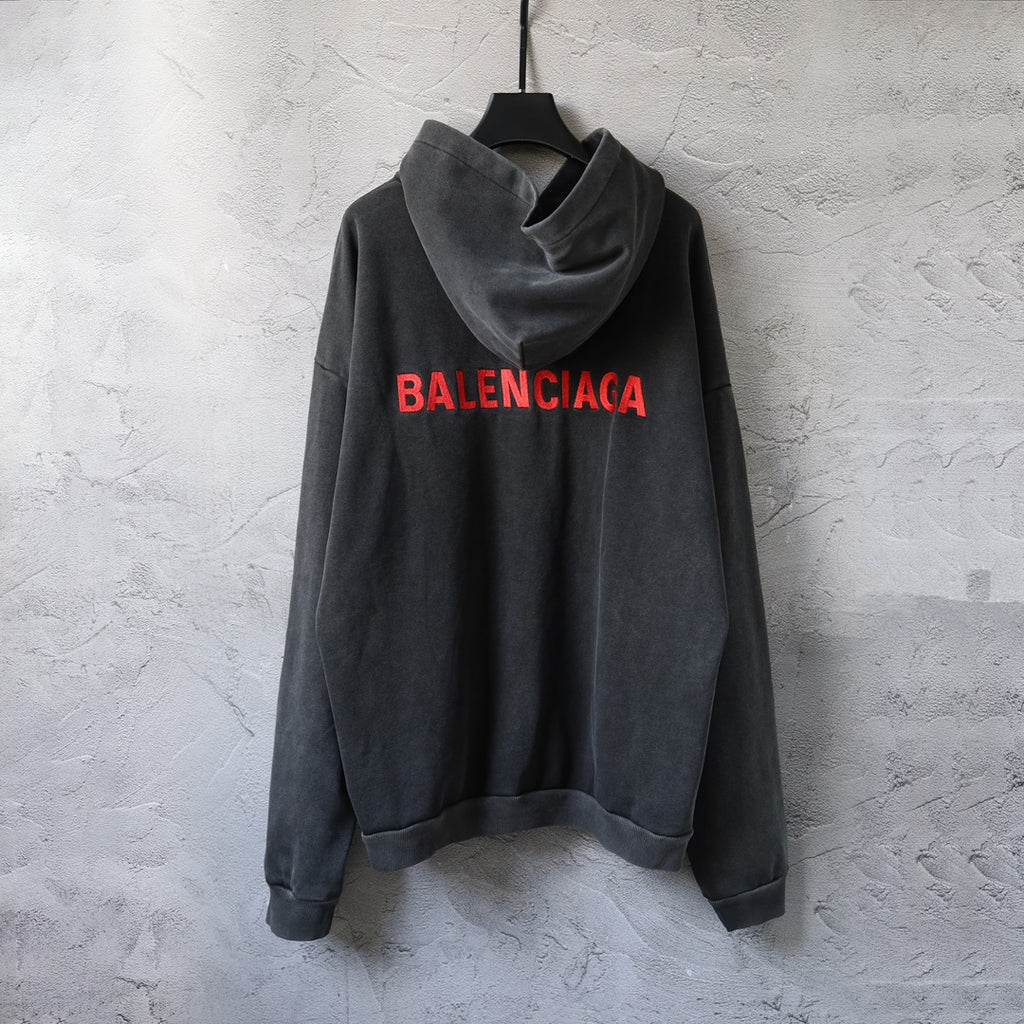 Balenciaga logo hoodie in dark gray with red BALENCIAGA text on the chest