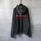 Balenciaga logo hoodie in dark gray with red BALENCIAGA text on the chest
