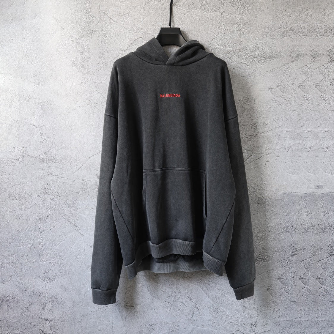 Balenciaga long-sleeve hoodie in dark gray with kangaroo pocket and drawstring hood