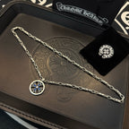 Chrome chain necklace with round blue cross pendant in a gift set tray