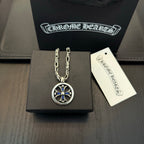 Chrome chain necklace with round silver pendant and blue cross detail