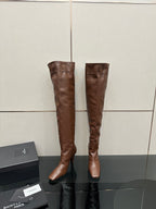 YSL knee-high leather boots, dark brown, side-by-side view with slim block heel