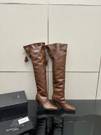 YSL ladies tall leather boots, dark brown, side view pair with tassels