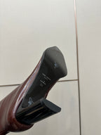 YSL ladies boot heel and outsole detail in dark burgundy glossy leather