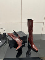 YSL ladies knee-high boots in dark burgundy glossy leather, pointed toe and stiletto heel