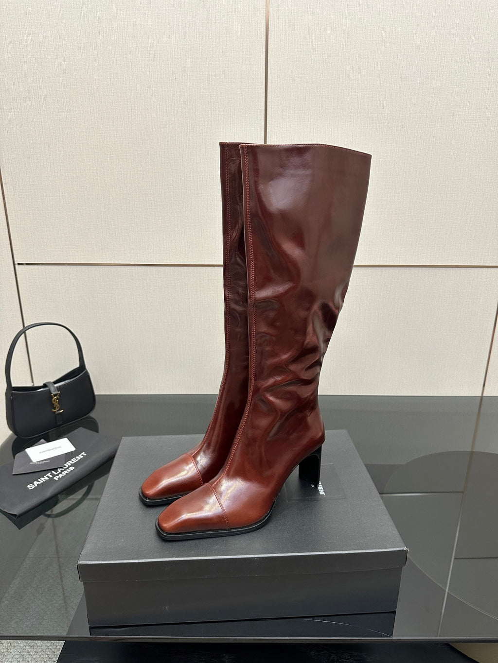YSL ladies tall knee-high boots in dark burgundy glossy leather, pointed toe