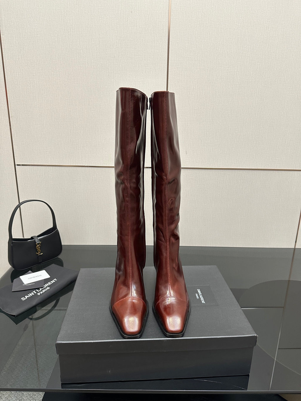 YSL ladies knee-high boots in dark burgundy glossy leather, slim stiletto heel