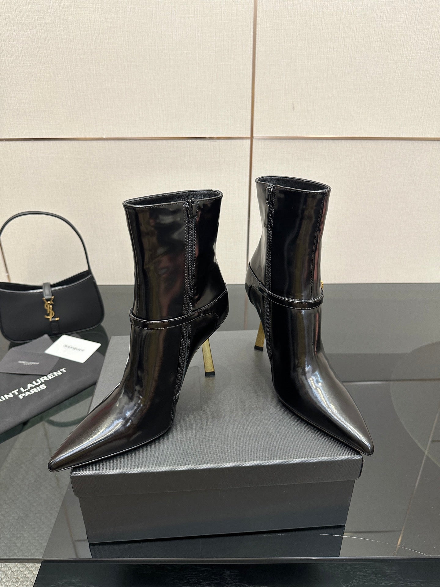 YSL ladies pointed ankle boots, black glossy with gold trim and slim high heels