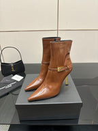 Women’s tan leather ankle boots with buckle strap, pointed toe, stiletto heel