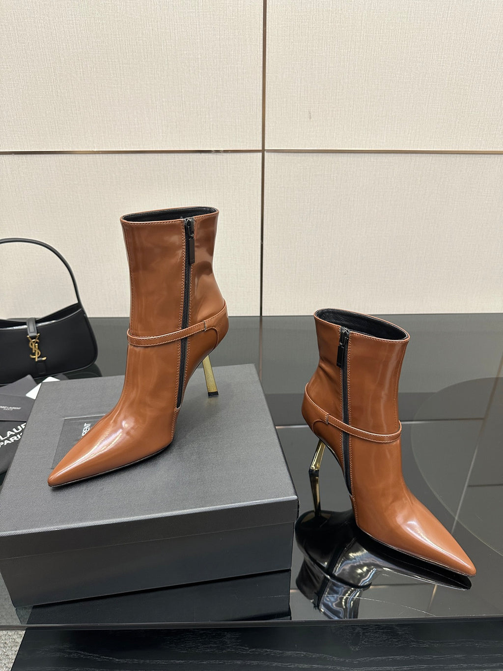 Women’s tan leather ankle boots, side zipper, buckle strap, pointed toe, high heels