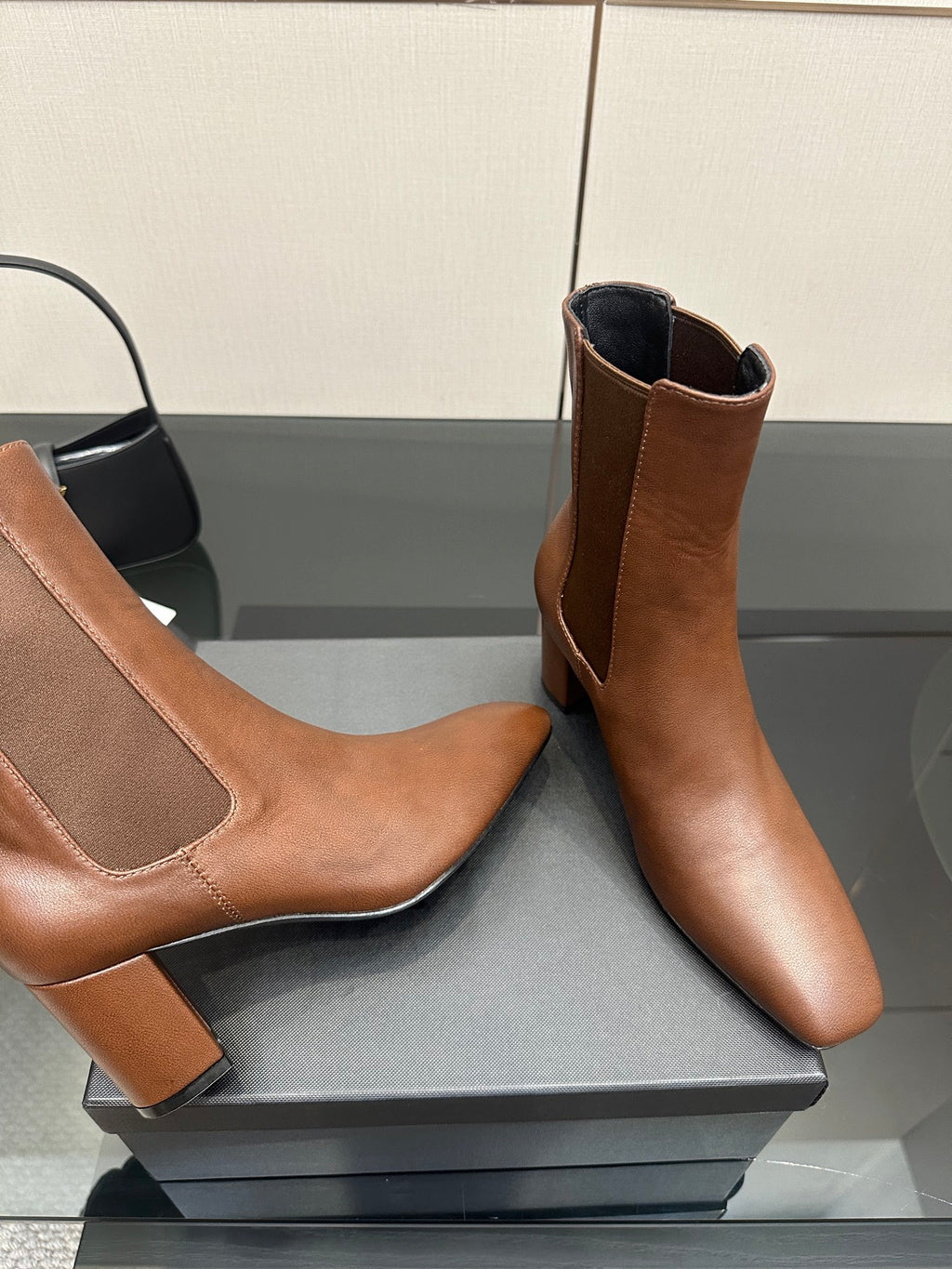 YSL ladies brown Chelsea ankle boots, close side view of elastic gore and block heel