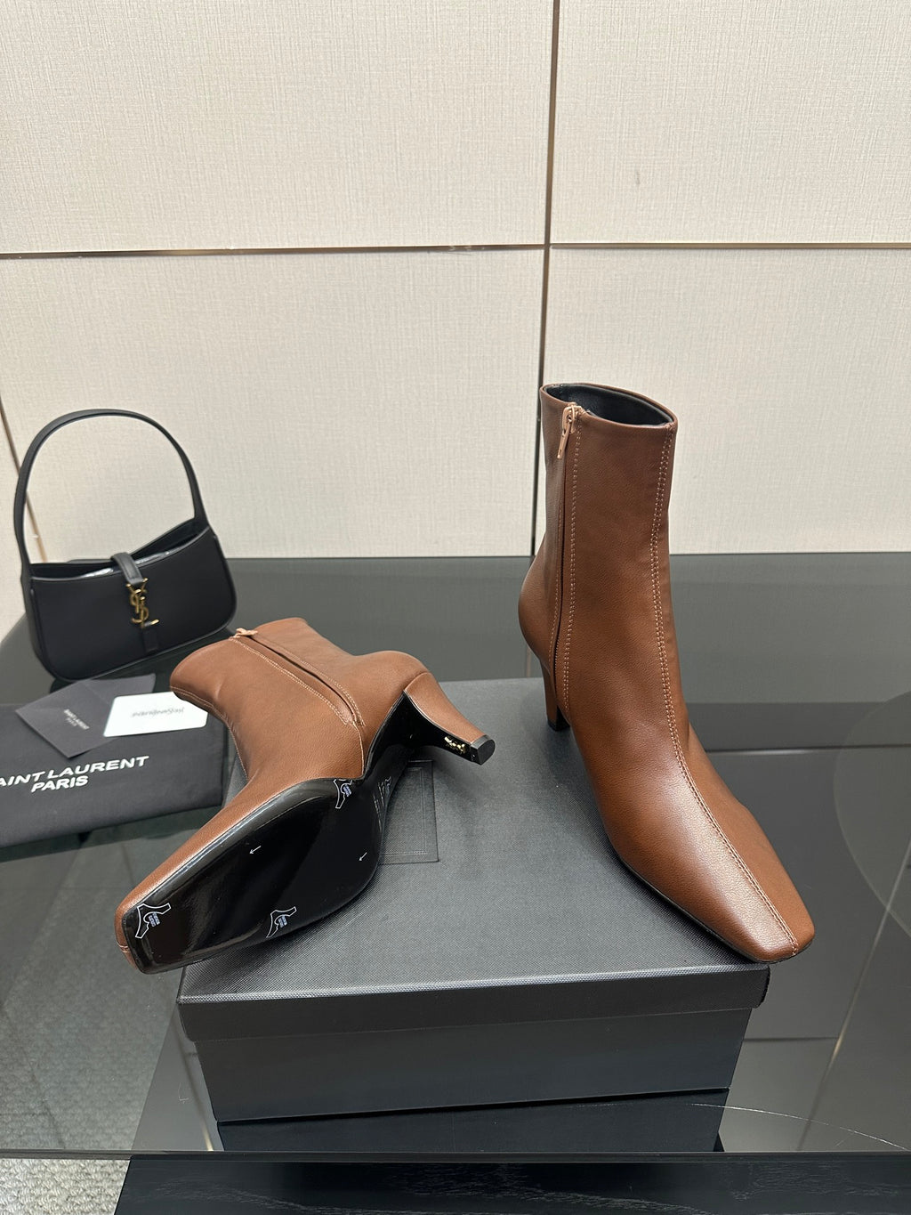 Women’s tan leather ankle boot with side zip, pointed toe and slim heel