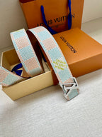 Patterned canvas belt with gold-tone buckle, light blue and multicolor geometric weave