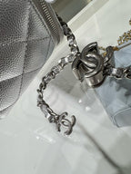Chanel bag chain strap with metal lobster clasp and CC charm