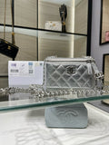 Chanel silver quilted chain crossbody bag with front flap and CC logo