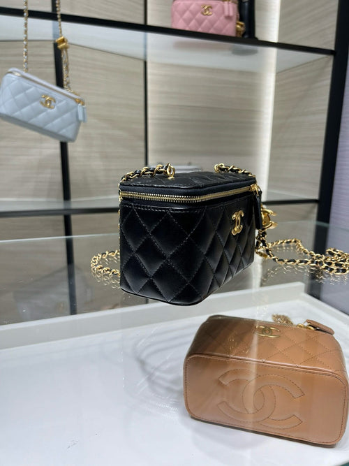 Chanel small quilted crossbody bag, black leather with gold chain and zip closure