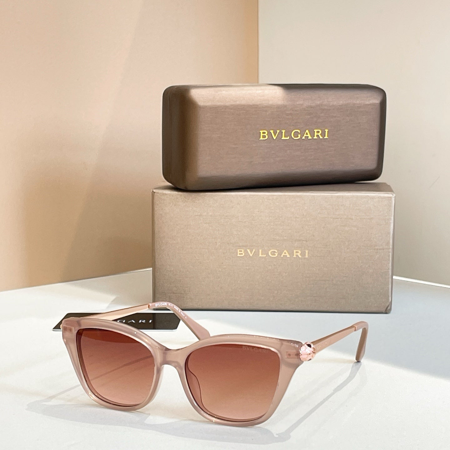Bvlgari eyeglasses with light frame and rose-brown tinted lenses