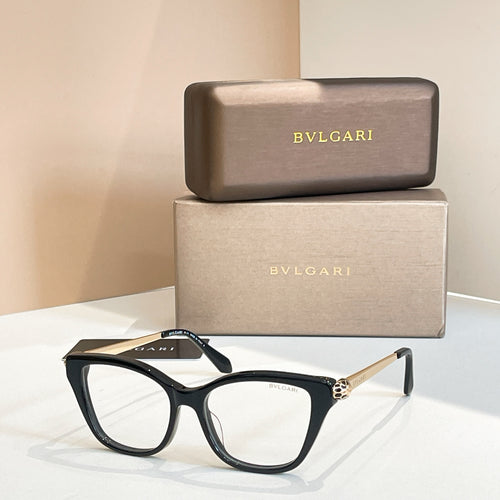 Bvlgari eyeglasses with dark frame and light lenses, gold logo detail at hinge