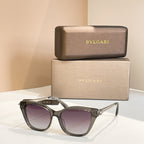 Bvlgari eyeglasses with dark rectangular frame and purple-tinted lenses