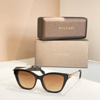 Bvlgari eyeglasses with black rectangular frame and amber-brown tinted lenses