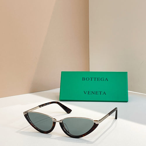 Bottega Veneta cat-eye sunglasses with dark lenses and tortoiseshell frames