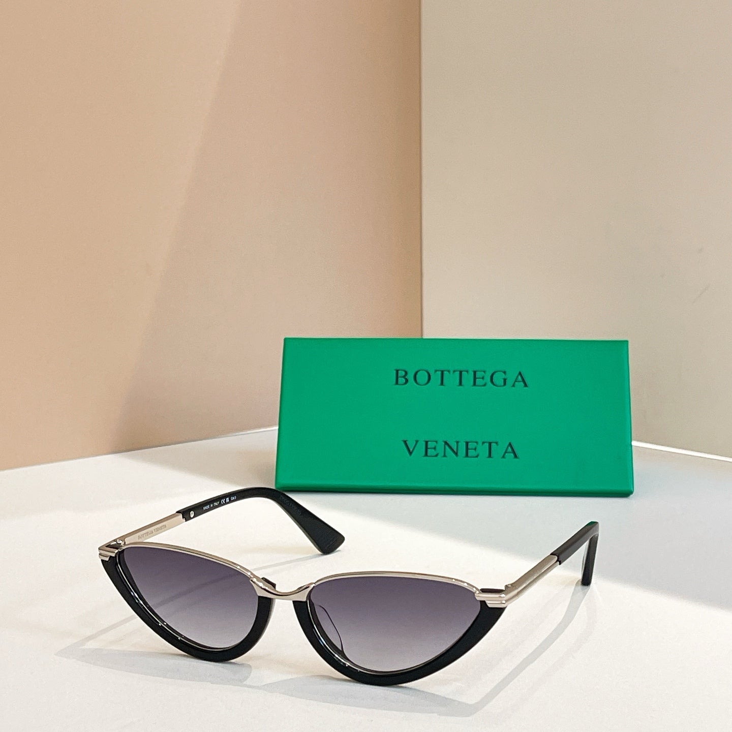 Bottega Veneta cat-eye sunglasses with dark lenses and tortoiseshell frames