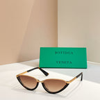 Bottega Veneta cat-eye sunglasses with amber lenses and tortoiseshell frames