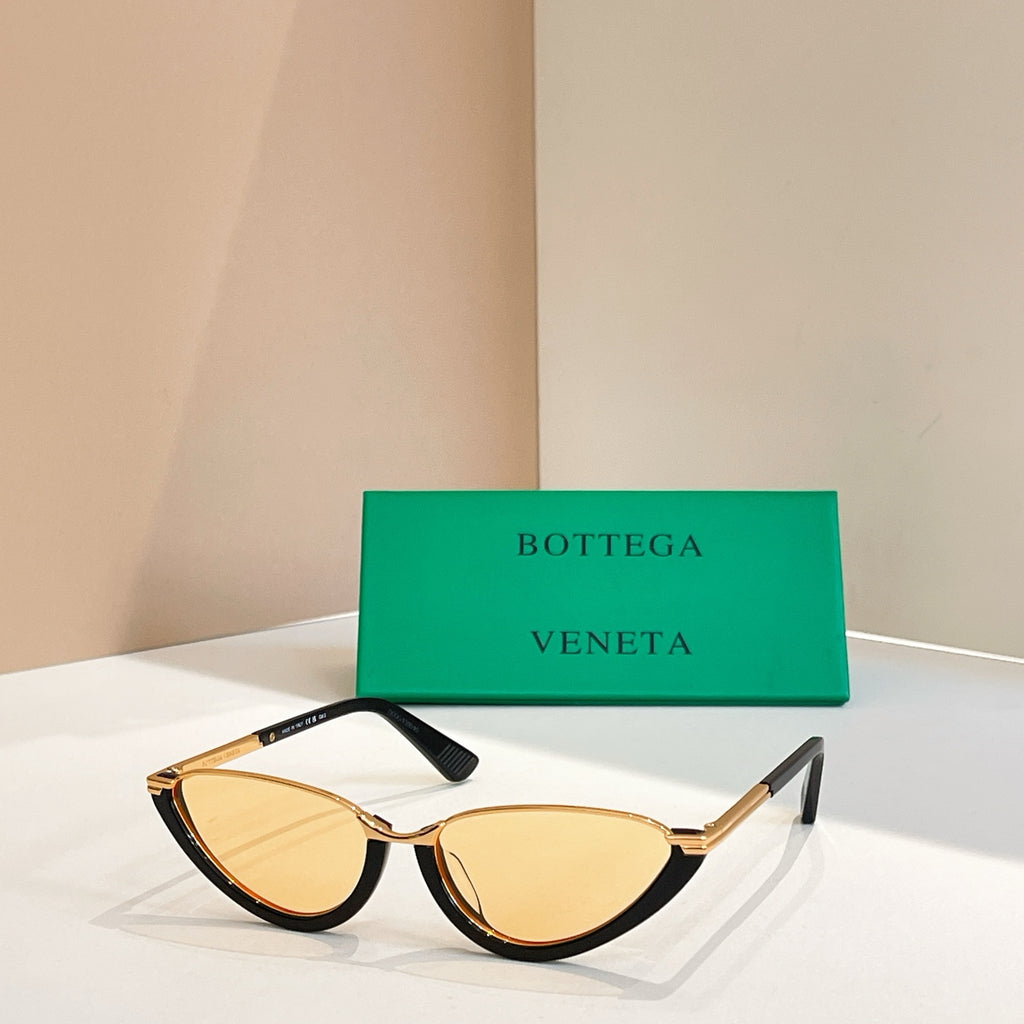 Bottega Veneta cat-eye sunglasses with amber lenses and light translucent frames