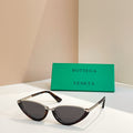 Bottega Veneta cat-eye sunglasses with dark lenses and tortoiseshell frames