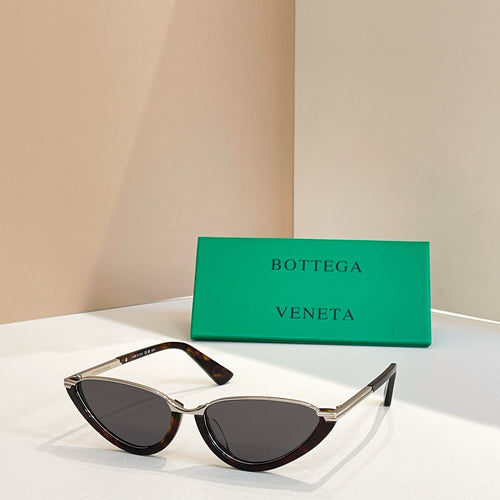 Bottega Veneta cat-eye sunglasses with dark lenses and tortoiseshell frames