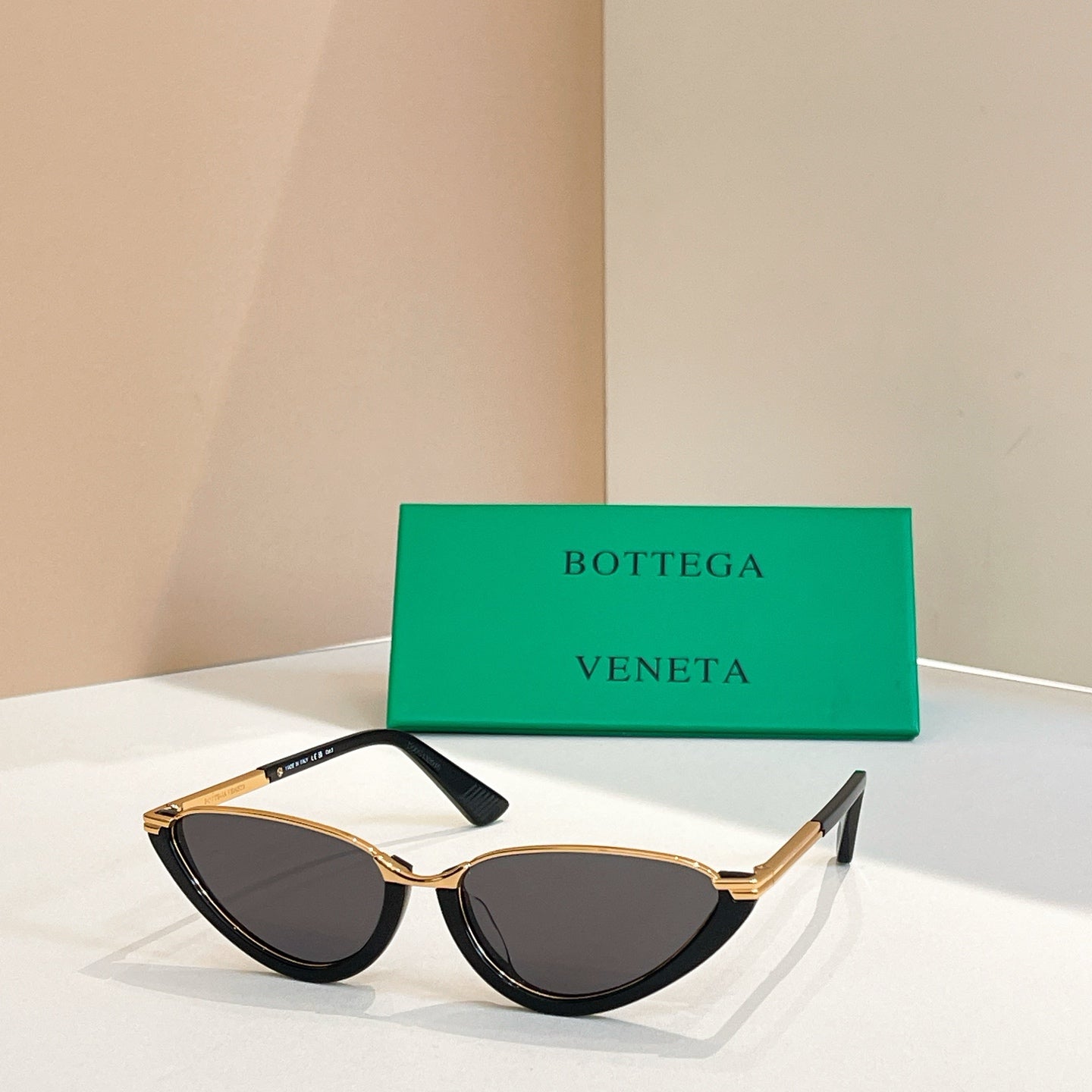 Bottega Veneta cat-eye sunglasses with dark lenses and tortoiseshell frames