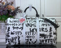 Louis Vuitton printed duffel bag with black handles and graffiti-style logo print